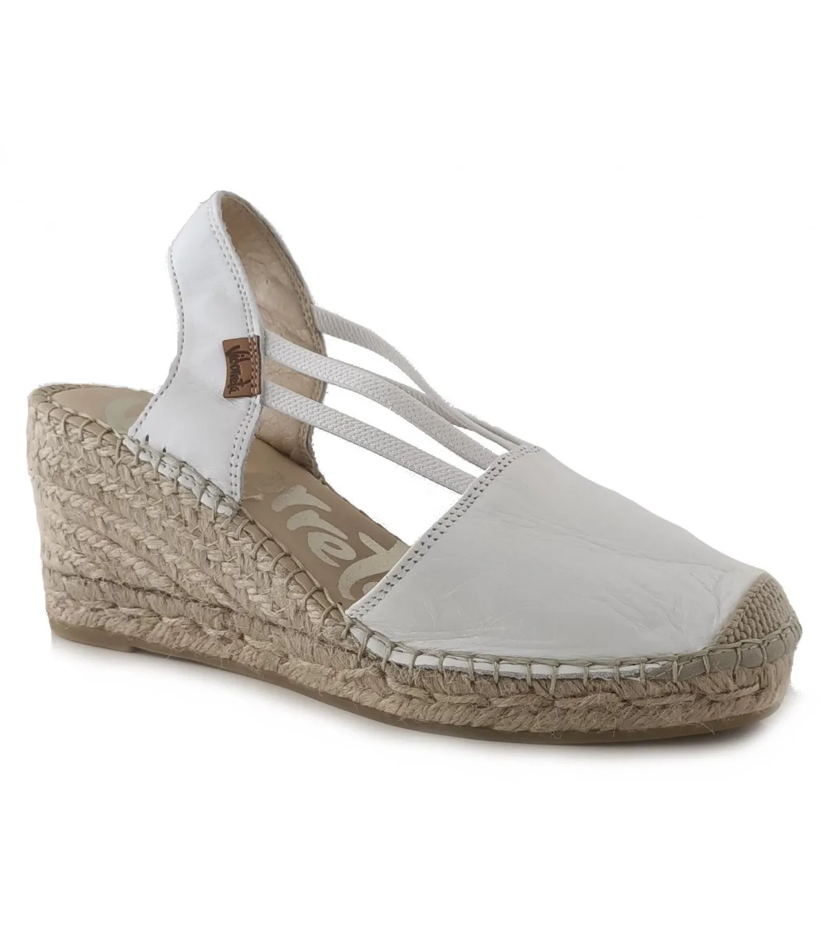 Alpargatas de cuña en piel blanca