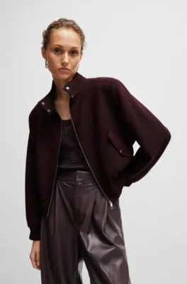 Chaqueta relaxed fit en sarga jaspeada con cremallera