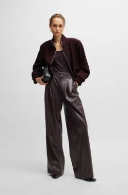 Chaqueta relaxed fit en sarga jaspeada con cremallera