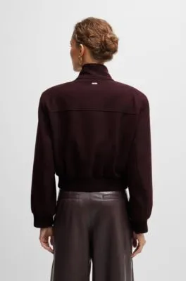 Chaqueta relaxed fit en sarga jaspeada con cremallera