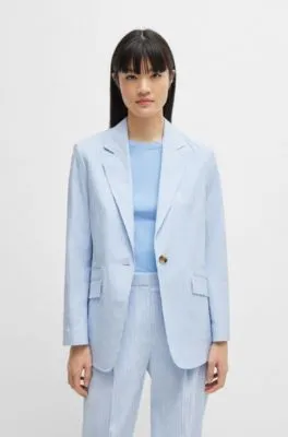 Chaqueta relaxed fit en sirsaca de algodón elástico a rayas