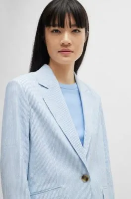 Chaqueta relaxed fit en sirsaca de algodón elástico a rayas