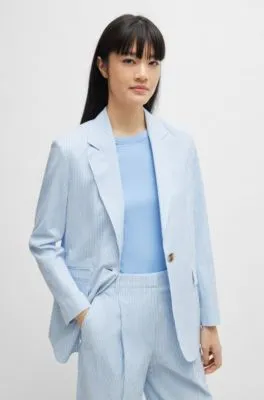 Chaqueta relaxed fit en sirsaca de algodón elástico a rayas