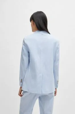 Chaqueta relaxed fit en sirsaca de algodón elástico a rayas